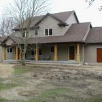 DEMO OLD COTTAGE AT THIS CREEK SIDE LOCATION AND BUILT NEW "RETIREMENT" HOME FOR OWNERS.